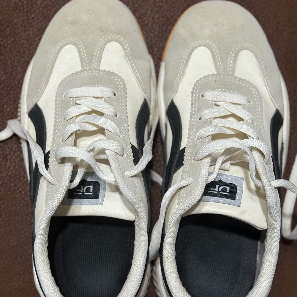 Women’s Off White and Black Sneakers.  Size 7, they fit more like 7.5.